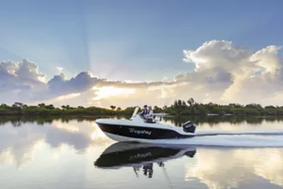 father and son riding on a Trophy T20CC Fishing boat