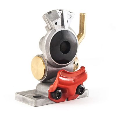 Red shut-off style emergency gladhand with a metallic finish and brass accents, designed by Tramec Sloan.