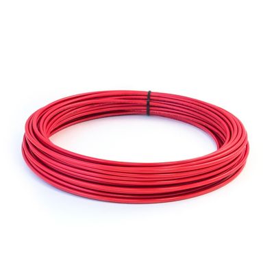 Red nylon air brake tubing coiled neatly, highlighting durability and quality for automotive use.