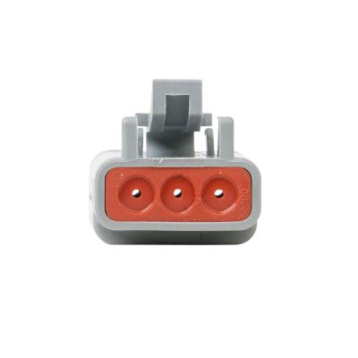 Gray and red ATM Series 3-way plug, featuring three circular ports for electrical connections.