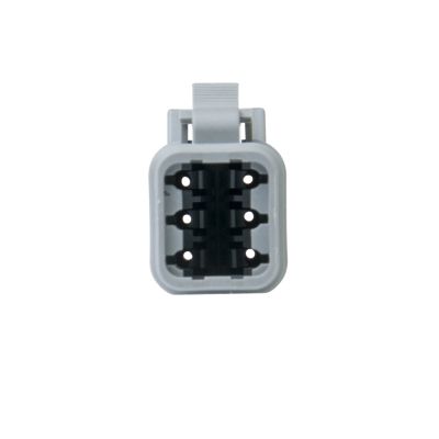 6-way ATM series plug with gray casing, featuring a rectangular shape and internal slots for secure connectivity.