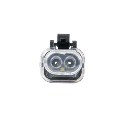 AT Series Plug with LED, clear casing, black clip, dual-pin connector, 24V electric component.