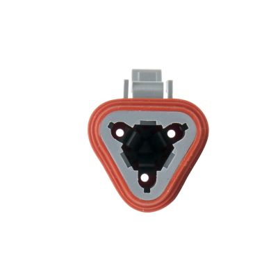 Triangular AT Series 3-way plug with orange seal for harsh environments.
