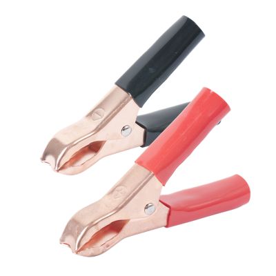 Red and black pigmy clips with copper jaws, ideal for 50 Amp usage, displayed on a white background.