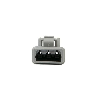 Gray DEUTSCH DTM 3-way plug showing front view with socket openings and latch. Ideal for automotive applications.