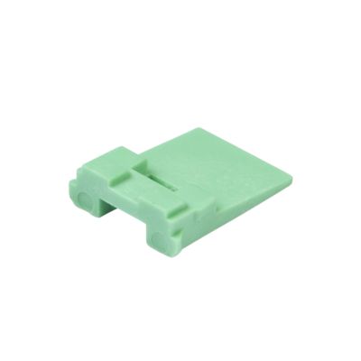 Green Deutsch DT 2-way receptacle wedge for secure electrical connections.
