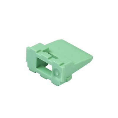 Green Deutsch W6P DT 6-way receptacle wedge with rectangular cutout, designed for secure electrical connections.