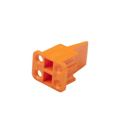 Orange Deutsch WP-4S DTP 4-way plug wedge with a compact design and four connector holes.