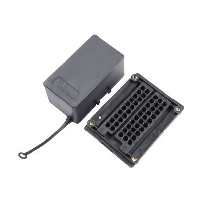 Bottomo of sealed fuse and relay combination panel with cover, showcasing slots for MINI fuses and MICRO relays, gray and black design.