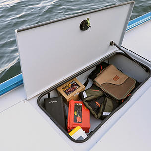 1875-1975 Renegade Bow Deck Port Storage Compartment shown with Gray Lund Guard Floor and Interior Option