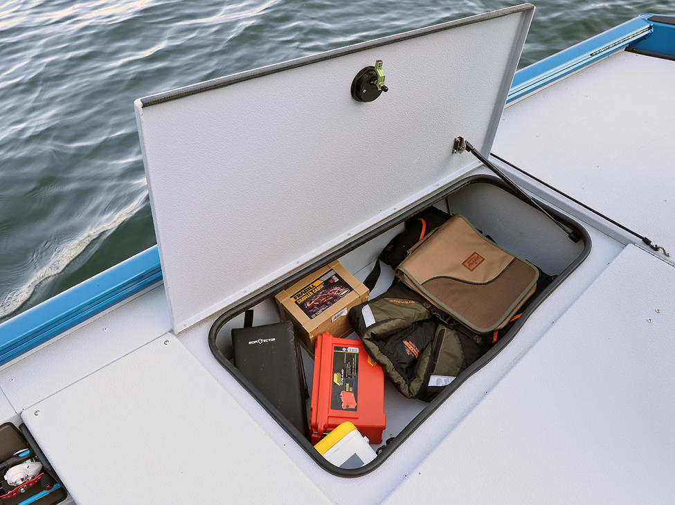 1875-1975 Renegade Bow Deck Port Storage Compartment shown with Gray Lund Guard Floor and Interior Option