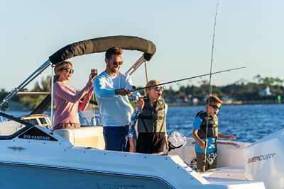 Family of 4 Fishing on Boston Whaler 210 Vantage Dual Console Boat