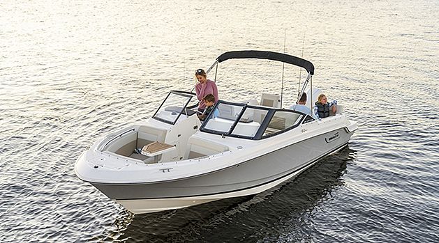 Family of 4 on Boston Whaler 210 Vantage Dual Console Boat, Front Portside View, Boat Anchored