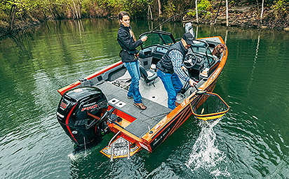 Two people fishing on a Lowe Deep V Model