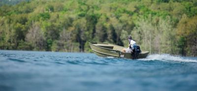 Fisherman on Lowe Jon Boat with Tiller Steering, Port-Stern View, Boat Underway on Lake