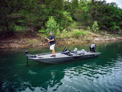 Angler in a cove casting his line from the Lowe Stinger 195 Bass.