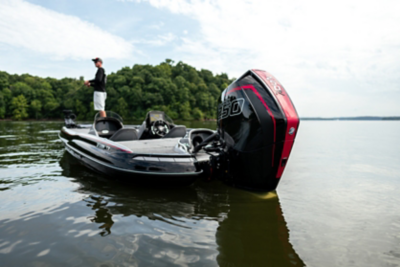 Challenger bass boat - ours has a newer 250 mercury motor and ostrich  seats.