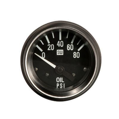 Stewart Warner heavy-duty gauge displaying oil pressure in PSI with a black face and white markings.