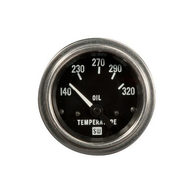 Stewart Warner oil temp gauge back view, showcasing electrical connections and metal casing for automotive use.