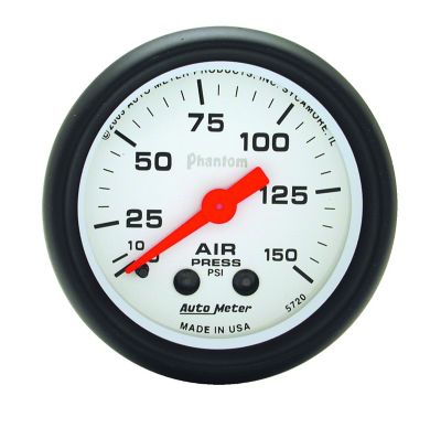 Industrial air pressure gauge with red needle and black casing, displaying PSI measurements for automotive applications.