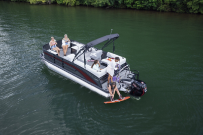 Five Friends on Lowe Pontoon Boat, Rider Preparing to Wake Board, Port-Stern View, Boat Anchored