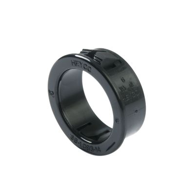 Nylon grommet snap bushing by Heyco, features black finish and circular design for electrical and cable protection.