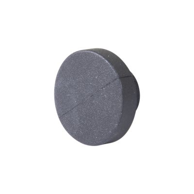 Rubber push-in bumper, circular design, dark color, used for mounting applications and protection.