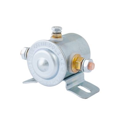 Cole Hersee solenoid, SPST, grounded intermittent type with metal casing and mounting brackets in focus.