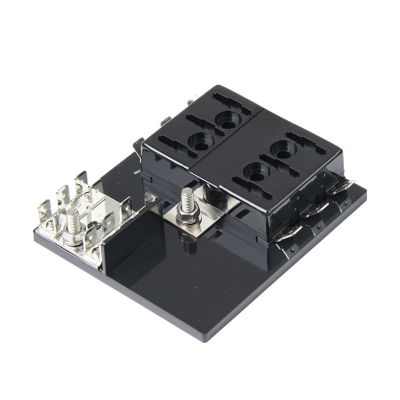 ATC/ATO fuse panel with grounding pad, featuring a sleek black design and six positions for efficient electrical connections.