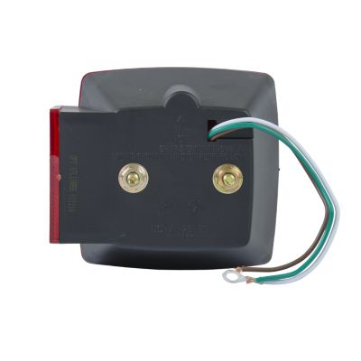 Back view of a stud mount combination tail light with wires and two bolts visible.