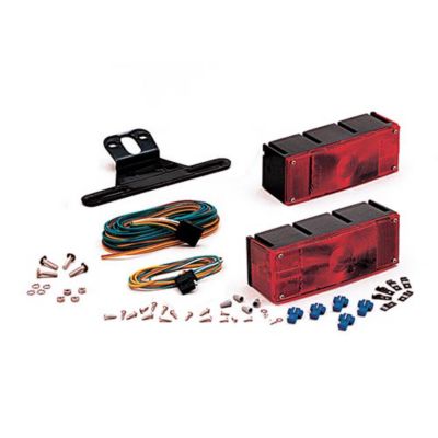 Waterproof trailer light kit with lights, license plate bracket, harness, and mounting hardware displayed.