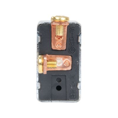 Die cast toggle switch, SPST, showing metal terminals and black housing, designed for electrical applications.