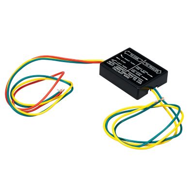 Trailer tail light converter with multicolored wires, simplifying 3-wire to 2-wire connections for enhanced vehicle lighting.