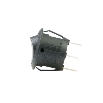 Round black non-illuminated SPDT rocker switch with three metal prongs, side view on white background.