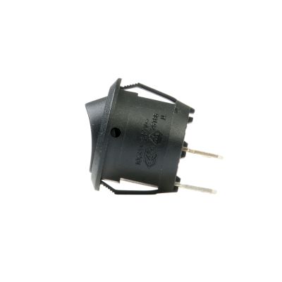 Non-illuminated round rocker switch with dual-color design and SPST configuration; black body with visible connectors.