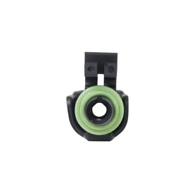 Close-up of a Weather Pack Female connector featuring a green seal and black housing, highlighting its durable design.
