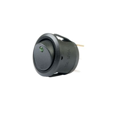 Green LED illuminated SPST On-Off round rocker switch for DC use.