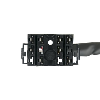 Universal turn signal switch harness connector with black casing, showcasing the detailed internal structure and wiring slots.