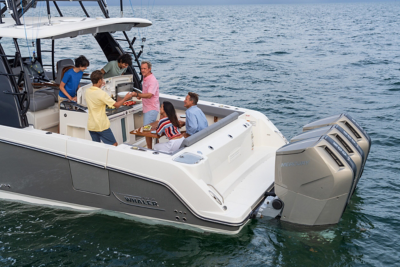 Family on Boston Whaler Outrage Center Console Boat