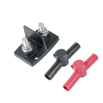 Dual power distribution block with black insulators and studs, featuring red and black connectors for electrical systems.
