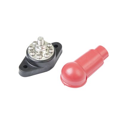 Power distribution block with red protective cap, featuring multiple connection points for electrical applications.