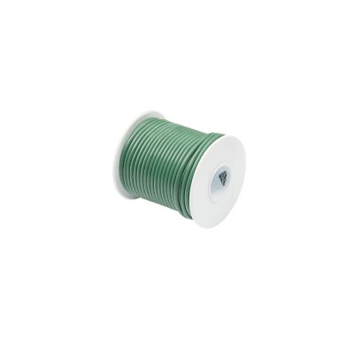 Green spool of wire with white ends, neatly coiled, ideal for crafting or DIY projects.