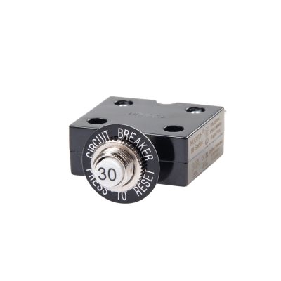 Push button circuit breaker with black casing and labeled reset button.