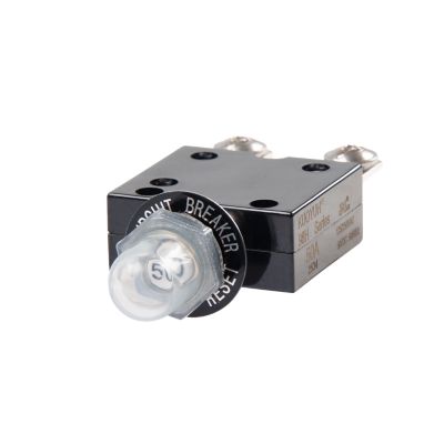 Black push button circuit breaker with metal terminals and transparent boot.
