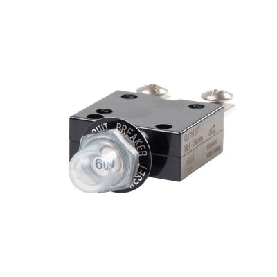 Black push button circuit breaker with metal terminals and transparent boot.