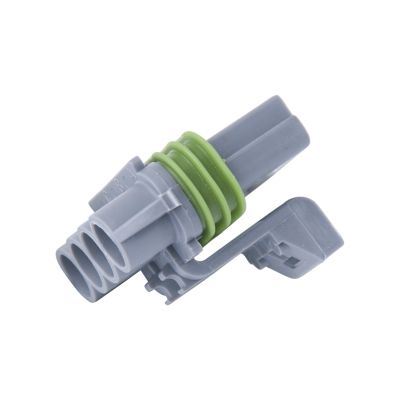 Gray Metri-Pack 280 4-Way Flat Connector, showcasing female housing design and green seal rings.