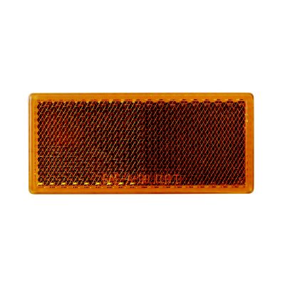 Amber rectangle reflector with stick-on backing from Optronics, designed for enhanced visibility and safety.