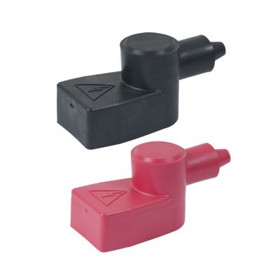 Black and red marine battery terminal covers with angular design and protective cap.