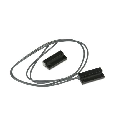 Black rectangular magnetic door switch with attached cable on a white background.