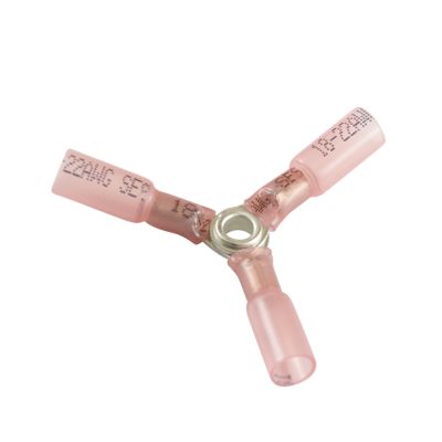 Pink heat shrink Y butt connectors with transparent sheathing and metal center for electrical wiring.